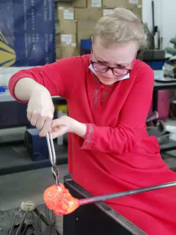 baskinha's tweet photo. Love to try new things and learn new skills! Yesterday my school invited all female employees to a super cool studio where I could try glass making. It was awesome!!! Made this blue vase #glass #lifelonglearning https://t.co/3n3yAz11J5