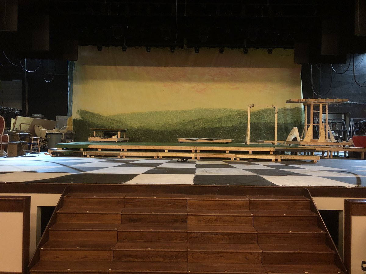catheatreirish's tweet photo. We got the backdrop hung this morning, everyone is so excited to see the fruits of our labors!! #catheatre #paintedbackdrop #AliceInWonderland https://t.co/6xCntlkAO7