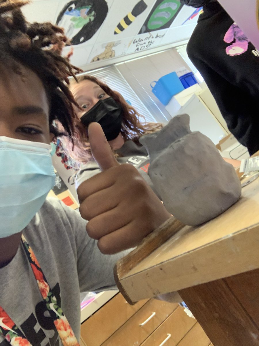 When your student is so proud of their project he wants to take a selfie with it...I’m on board for that! This pinch pot vase is “icy” to be exact! #LHJHart #risdartmatters #teamLHJH #ilovemyjob