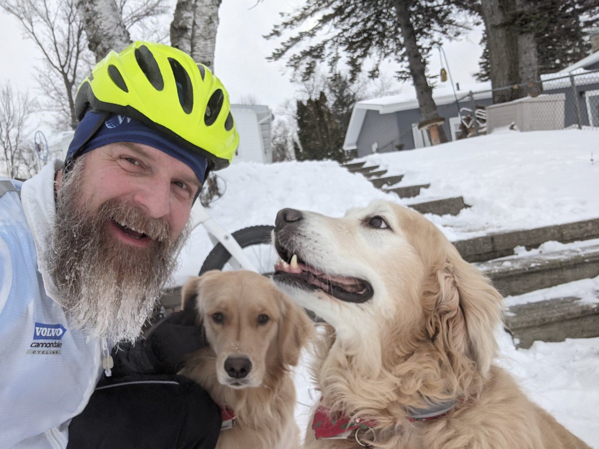 EricCook's tweet photo. @ChrisCommando #TheCookDogs welcoming me back from a ride in the frozen lake. #NorthernMichigan The snow is melting now... and the beard is not as long now - but love this pic. 🐾♥️ https://t.co/iD05SaeiWu