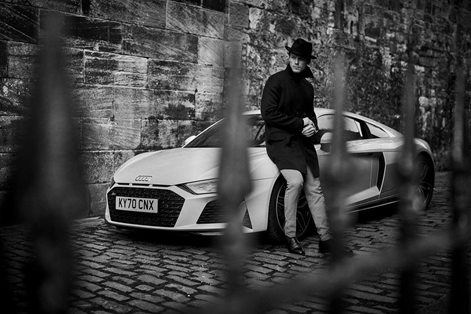 AudiUKPress's tweet photo. Audi Ambassador @samheughan is the epitome of style as he appears alongside the Audi R8 in this month’s @squaremile_com https://t.co/MXA4MnCdiE https://t.co/Zc2AXUO3IF