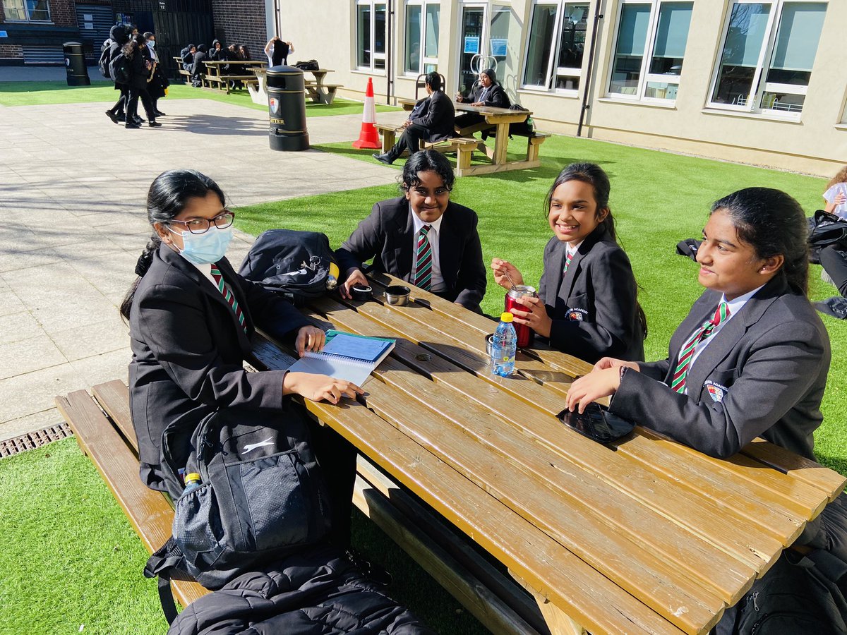 Students enjoying the fresh spring air before replacing their face coverings for afternoon line ups!