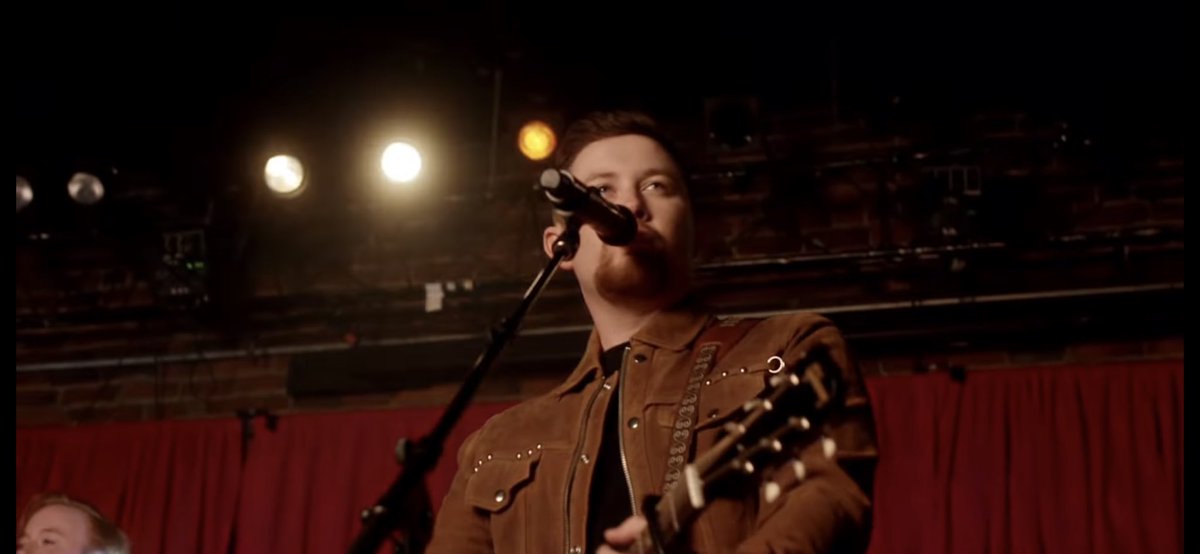 mercylounge's tweet photo. Anyone recognize the iconic red backdrop in @ScottyMcCreery’s new video? 😎😇 https://t.co/WAb3TctErh https://t.co/P8u1TURsFY