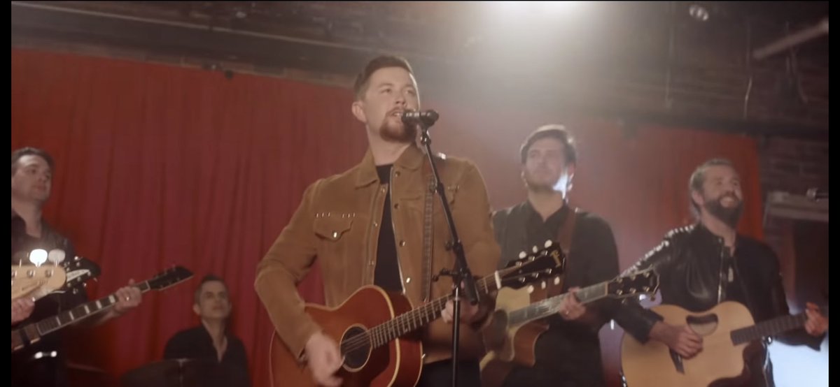 mercylounge's tweet photo. Anyone recognize the iconic red backdrop in @ScottyMcCreery’s new video? 😎😇 https://t.co/WAb3TctErh https://t.co/P8u1TURsFY