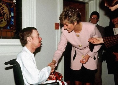 princess diana shaking the hand of an aids victim with no gloves on, a move that would work to reduce aids stigma &amp; help prove that aids is not spread by skin to skin contact (1991).