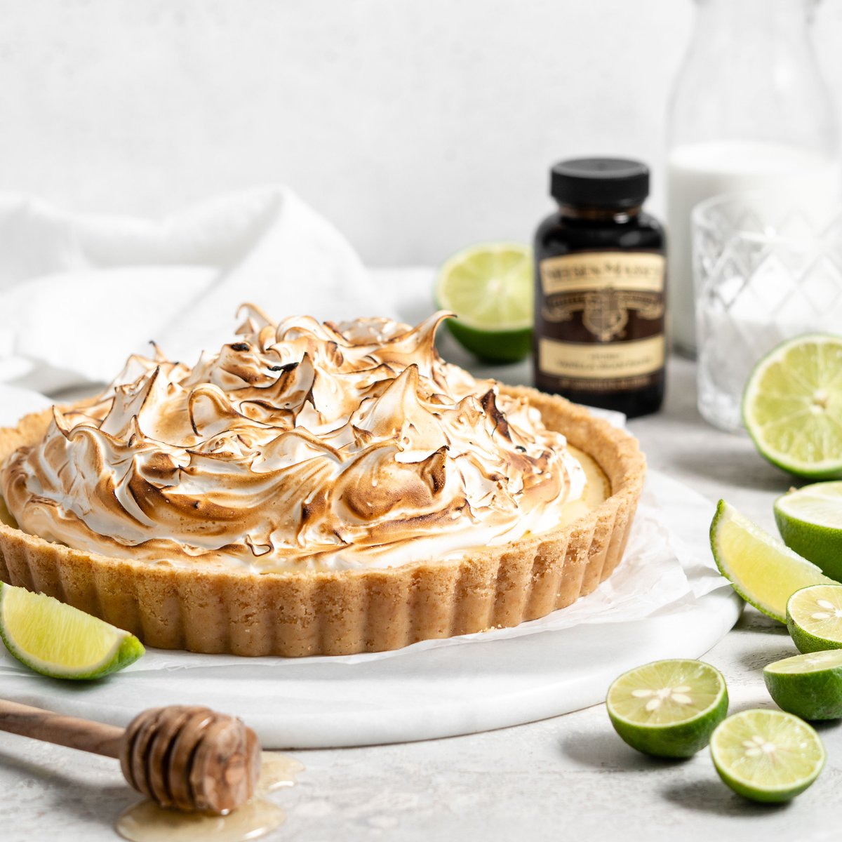 NielsenMassey's tweet photo. Nothing captures the feeling of sitting on a beach with your toes in the sand like a bite of classic key lime pie. In our version, honey-sweetened meringue combines with the bright tartness of key lime to create a blissful bite of sunshine. https://t.co/Bgkwq96ZWq #BakeforYou https://t.co/NWXNXKpPs6