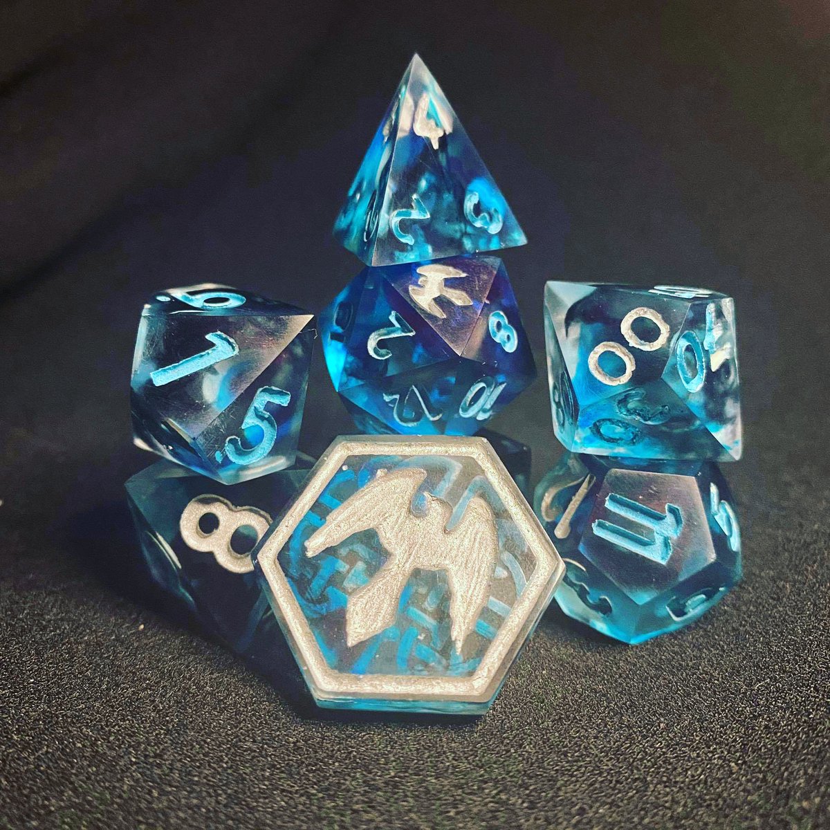 RavenandRiddle's tweet image. Deep in a hidden room in your new husband’s castle you find these dice, as blue as his beard. But beware... he hates it when they’re touched This is the #Bluebeard set from our #fairytalecollection, live now on #Kickstarter kickstarter.com/projects/raven… #handmadedice #ttrpg #dnd
