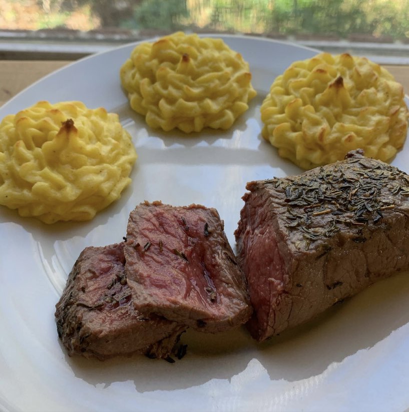 I’ve been learning how to cook. Here’s a garlic and thyme steak with duchess potatoes.