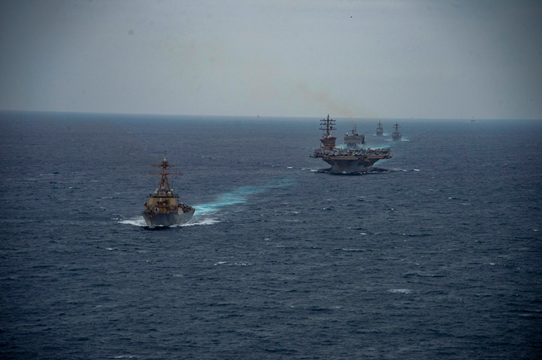 TheCVN69's tweet photo. We just couldn't help but to post more of our Strait of Gibraltar transit. Random fact - many refer to it as the STROG. #ThereWillBeATest #WeLikeIKE https://t.co/d5XyRNWNjj