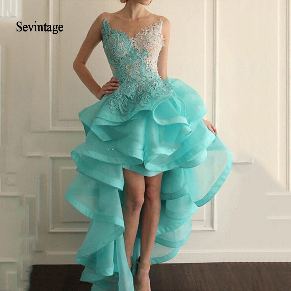 ChicGirlStreet1's tweet photo. Sevintage 2020 Blue High Front and Low Back Cocktail Dresses Illusion Neck Organza Lace Appliques Ruffle Beads Homecoming Gowns #followme #me https://t.co/JX8HIEaXiG https://t.co/I9JXqSZyb2