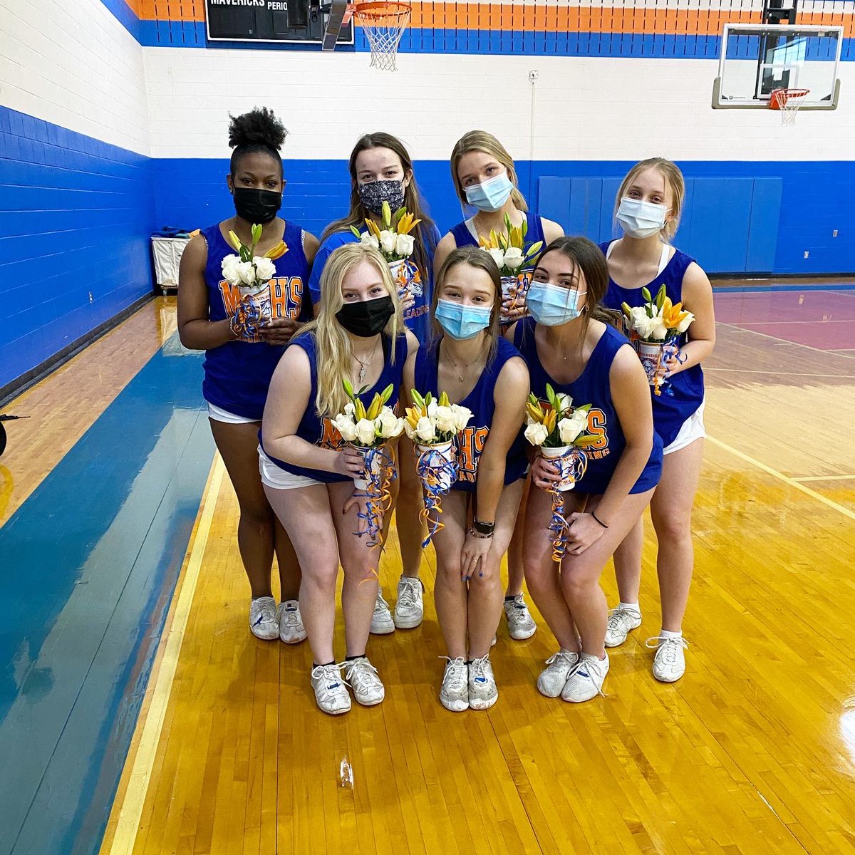 MRMavsCheer's tweet photo. The @MarvinRidgeFB seniors brought flowers to the senior cheerleaders in honor of senior night this Friday and it was the cutest 🌸🥰 #classof2021 https://t.co/u0DF0ksUX3