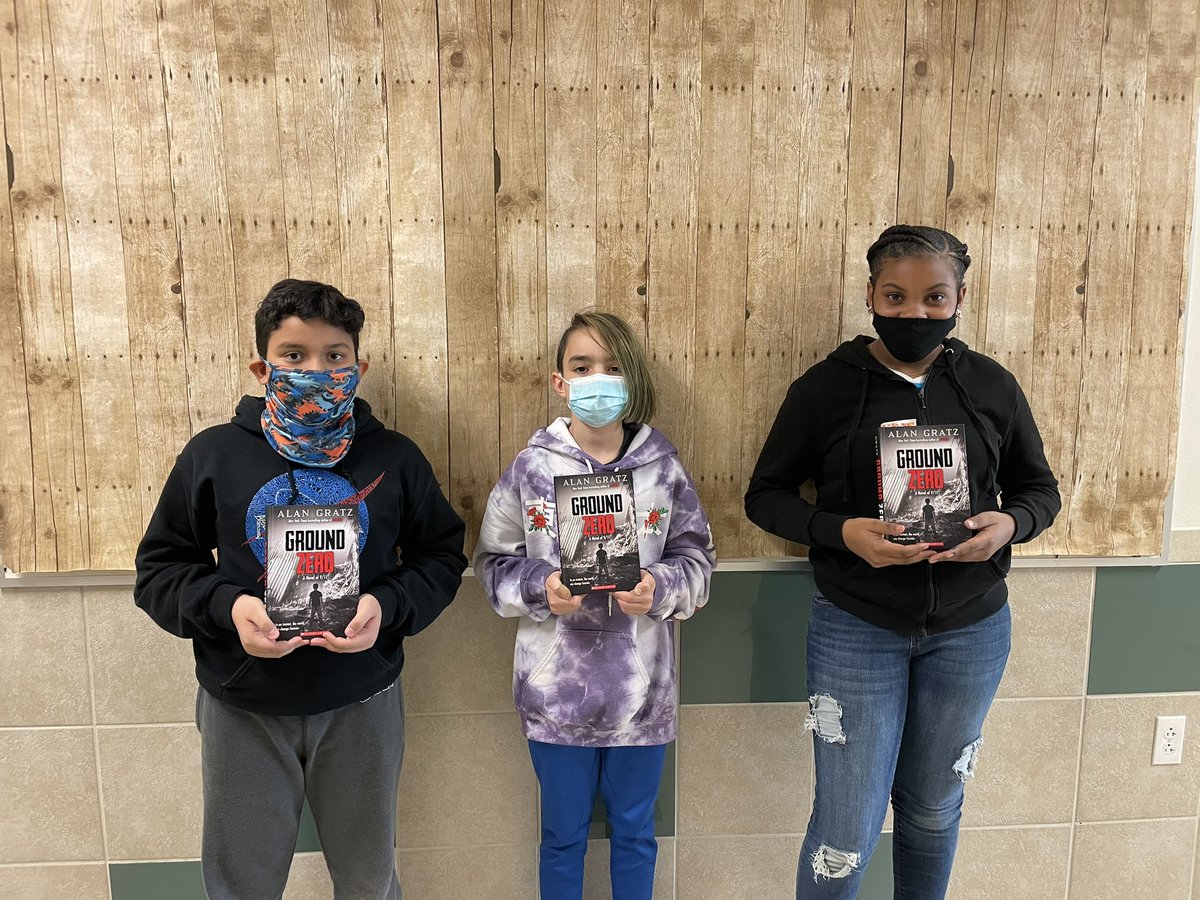 Ms_Araiza's tweet photo. My students and I are currently obsessed with reading and discussing historical fiction, in particular, books written by the amazing @AlanGratz! Today, 3 of my kiddos bought Ground Zero at our school book fair and started reading immediately! My teacher heart is ecstatic 🤩 https://t.co/U8Cb3RiIKx