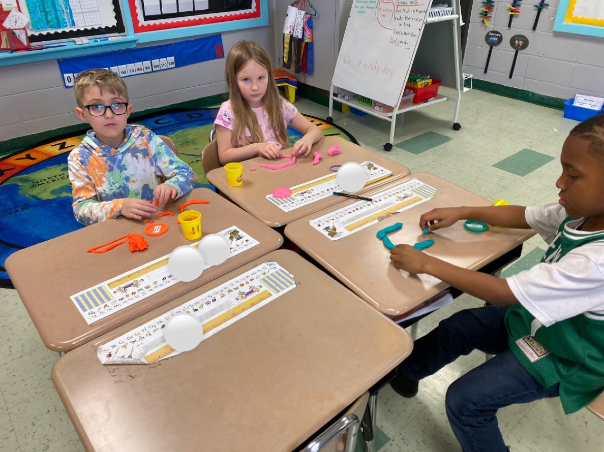 Beginning our new unit over shapes by creating them out of playdoh!