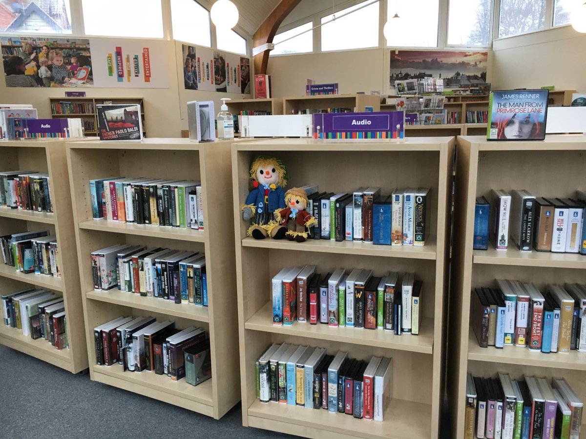 Aldeburgh Scarecrow has got his nephew visiting and he's been showing him around the library. They're taking a look at our newly-stocked Audio book section. 🥳