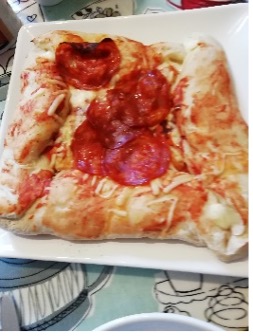 One of our Year 8 students decided to make a fire pit pizza with their family. They cooked the pizzas on a pizza stone using foil wrapped around the inside of the fire pit lid to bounce the heat onto the top of the pizza. This looks so delicious! Well done! 🍕