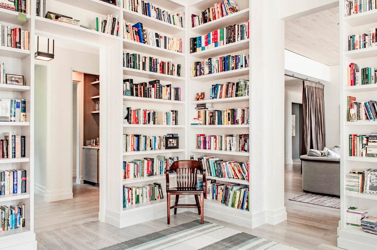 This light and airy library puts us in the mood for spring! #BloomfieldOriginals #nashville #renovations #architecture #interiordesign #customcabinetry #customcabinets #powderroom #bathroom #bathroomdesign #modernbathroom #classicbathroom #traditionalbathroom