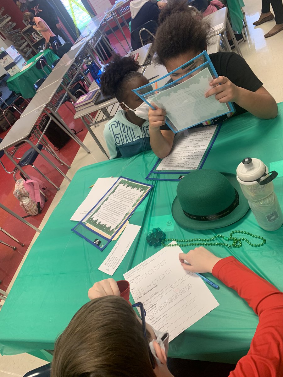 KathyPaul_OMS's tweet photo. Grammar review escape room style! Rotating students in and out of all classrooms in 6th grade ELA this week for review of standards and skills! Let’s find Lucy Leprechaun! #faketexts @OMS_Chargers #weoverme #grammar #fiction #informationaltext #poetry #teamwork https://t.co/gXpsy5c5xW