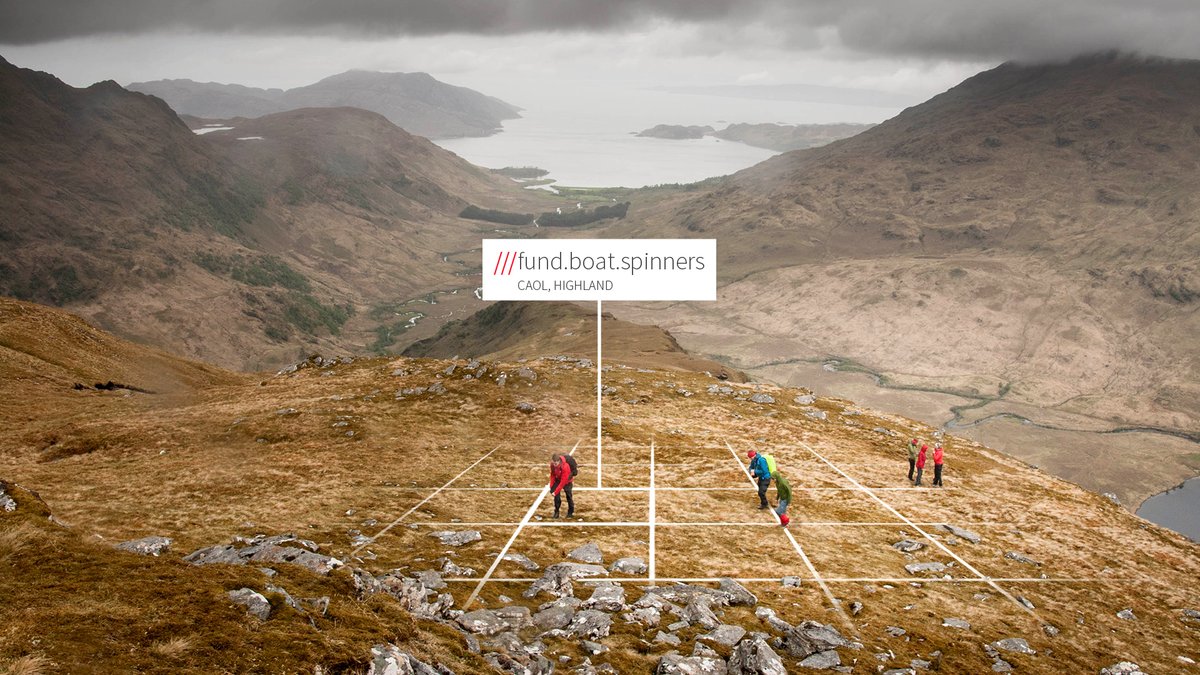 a group of people are in a mountainous region of scotland. It's a wide panoramic shot with a grid overlayed. the what3words address reads ///fund.boat.spinners.
