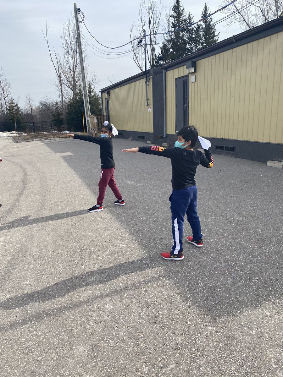 MsGhazi2's tweet photo. Made paper airplanes at lunch and now we test them outside! https://t.co/j15rYPSEzV