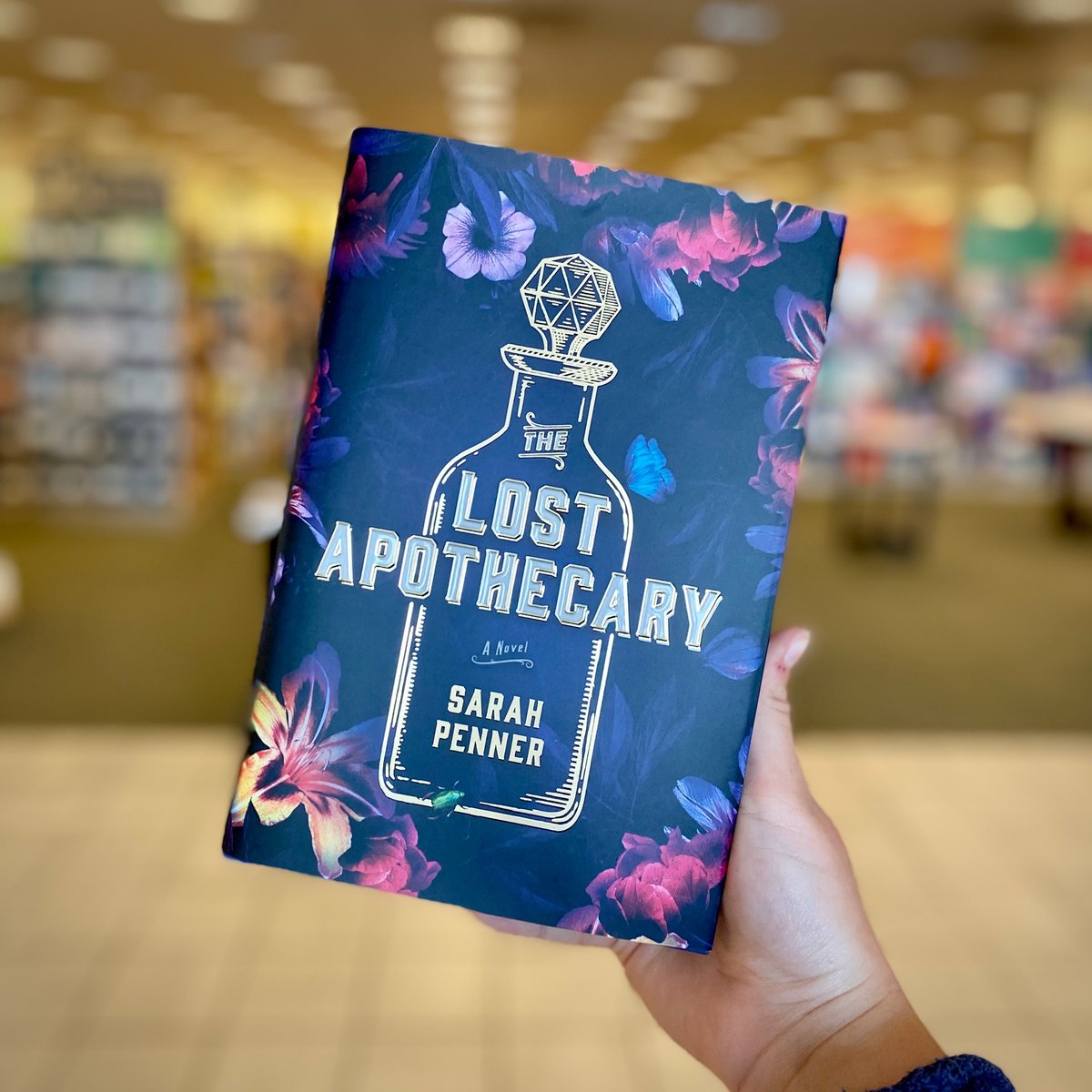 The cover of The Lost Apothecary by Sarah Penner gives us major dark Wonderland vibes 😍 This utterly unique mix of historical fiction and mystery thriller will have you reading late into the night! Cover design by Elita Sidiropoulou
#BNTemecula #142BN #BNDiscoverPick