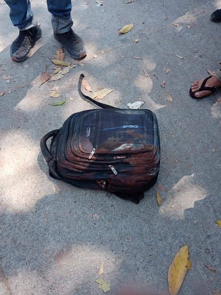 MeinBangswiftaa's tweet photo. Here is the bag of the demonstrator who passed away with the serious gunshot in his head. It is said that the armed soldiers used 5.56 mm bullet, military assault rifle MA 1.

#Mar11Coup 
#WhatsHappeningInMyanmar https://t.co/hJ6gwCu3E5