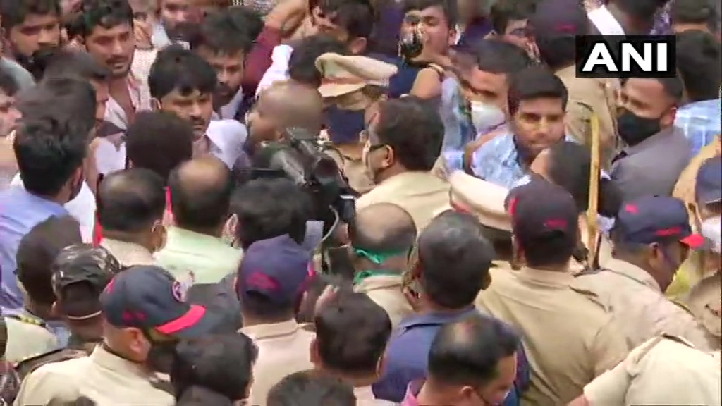 ANI's tweet photo. Maharashtra: MPSC (Maharashtra Public Service Commission) aspirants hold protest in Pune after the exam was postponed, in view of rising COVID19 cases https://t.co/I4poChA8tb