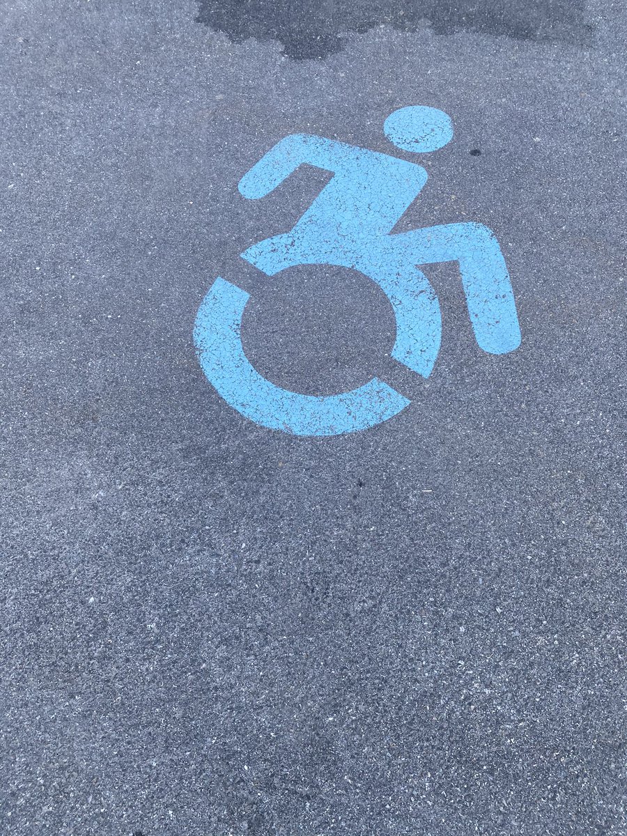 mgrossman's tweet photo. Someone tell me why this handicap parking symbol looks like it’s trying to get away QUICK! https://t.co/oJlP2mfWBH