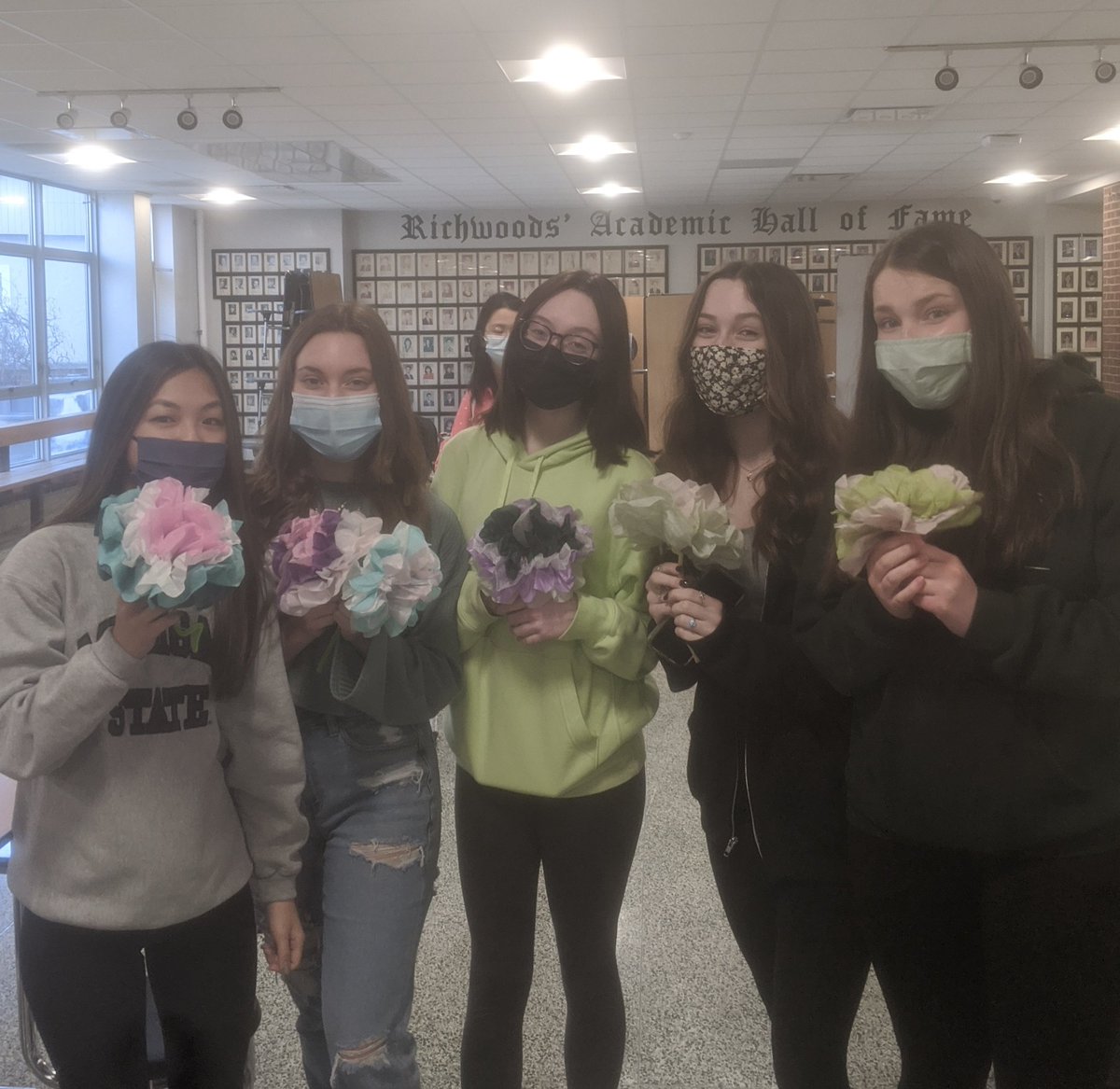 we love our tissue paper flowers here at  interact! they will be going to a nursing home as a spring surprise! 💜