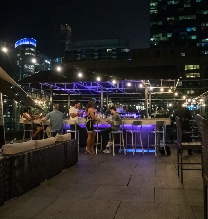 IvyChicago's tweet photo. #ThrowbackThursday to the good ol' rooftop days.

Rooftop season is coming soon and we can't wait to safely re-open and serve you again! 😷💜 https://t.co/0bSzt5rMeC
