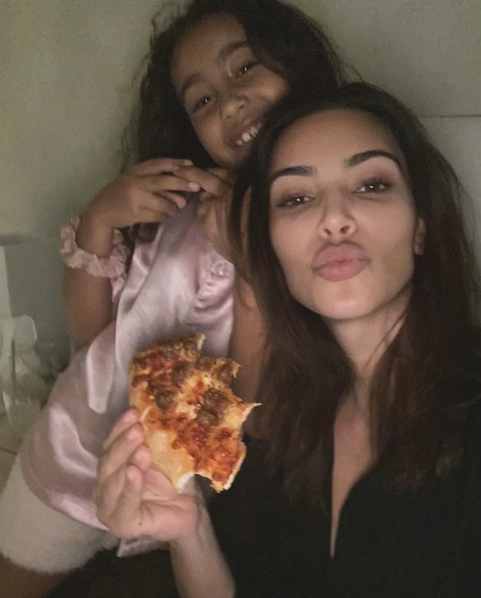 KimKardashian's tweet photo. Pizza Party 🍕 https://t.co/KGGHXDrT70