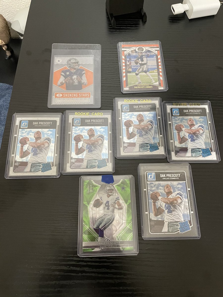 Cowboy_Wayz's tweet photo. I knew all you people we’re gonna buy my Dak’s soon so I stocked up last week. Got these optics for less then what Donruss is right now lol #4ForLife #TheHobby https://t.co/0gr3vnUfDE