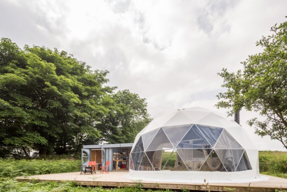 Stunning unique Geodome tents available for glamping this summer across the UK. Ekopod in Cornwall includes domes with a super king size four poster bed, kitchen, bathroom annexe, wood burning stove and terrace. See all our domes at bit.ly/3cjzdtK #glamping #glampinguk