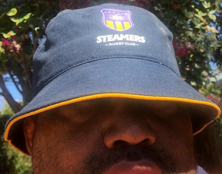 I showed this photo to my psychic during my weekly session and she said, “Michael, under that hat I see a premiership”