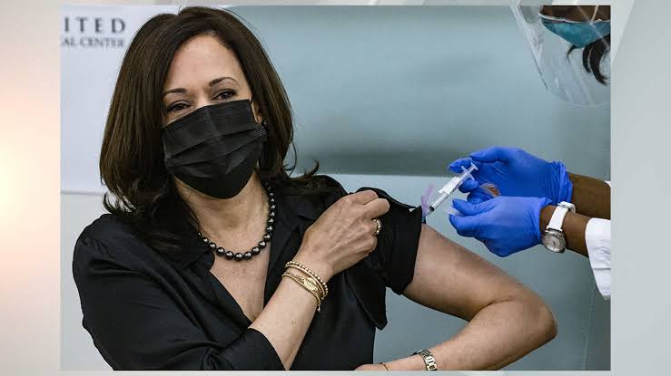 mmmicheni's tweet photo. That the vaccine shot is given at the shoulder is information in the public domain. 

Biden's &amp; Kamala's campaign teams told their bosses to dress appropriately. Our local leaders were kept aloof. 😐 https://t.co/m33hJLLa2b