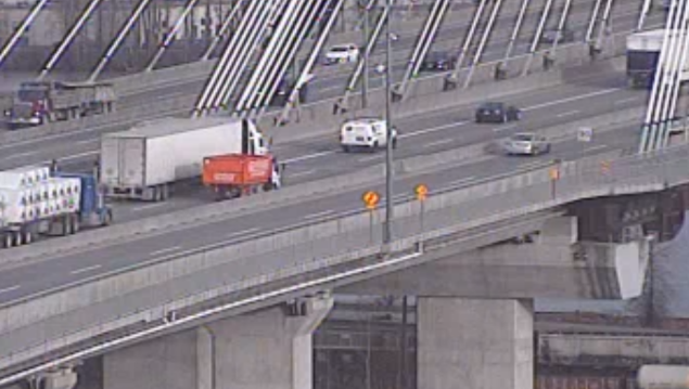 DriveBC's tweet photo. #BCHwy1 - Stalled truck WB on the #PortMann bridge in the right through lane, crews en route. Drive carefully and expect delays. #SurreyBC #Coquitlam https://t.co/zEiYjjM3Eo