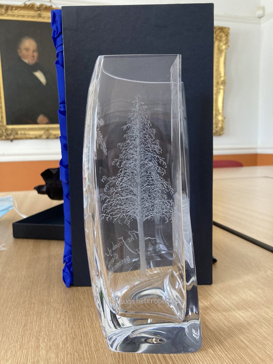 GlasgowBotanic's tweet photo. At 4pm under the watchful gaze of Thomas Hopkirk, founder of @GlasgowBotanic and his wife Elizabeth, current Manager Ewen Donaldson signs off after 47 years. The Friends of Glasgow Botanics presented an engraved vase with the Kibble Palace and Western Hemlock. Happy retirement. https://t.co/9EorSj6Clp