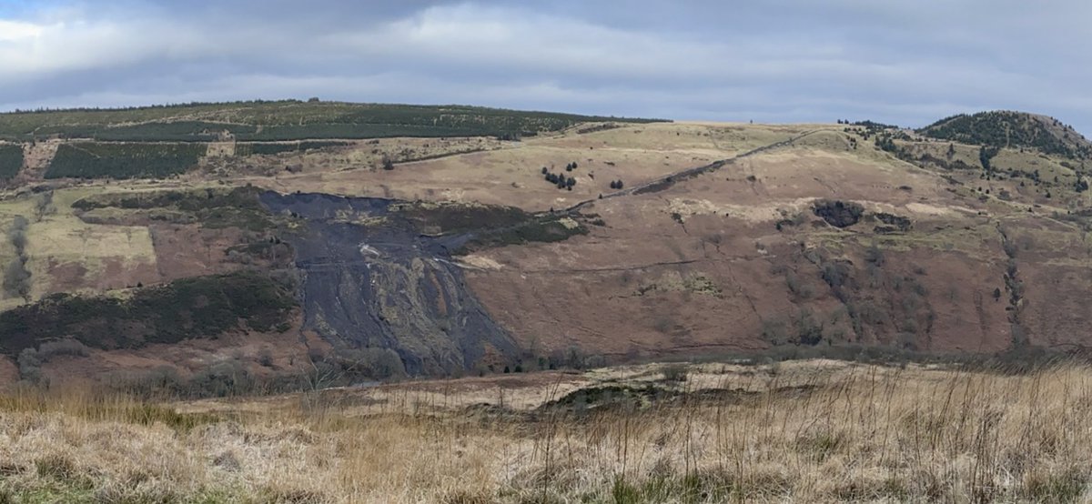WelshCoalTips's tweet photo. In 2020: 60,000 tonnes of coal waste slid to the valley floor in Tylorstown (Rhondda).  After a whole year, various government agencies tell us there are still 294 coal tips in South Wales deemed as 'high-risk'.  They still won't publish the location of these tips and reports. https://t.co/V83aip6XWo