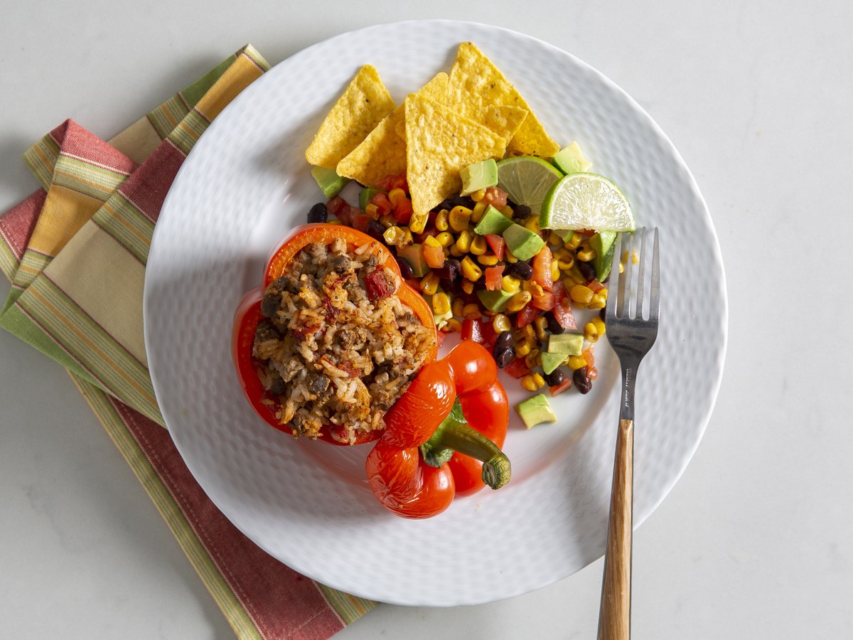 If you love making delicious and easy dishes in the crockpot, then add these Taco Stuffed Peppers to your shopping list for the week or save them to your favorites for later! Find the recipe on this week's Slow Cooker plan. #emealseats