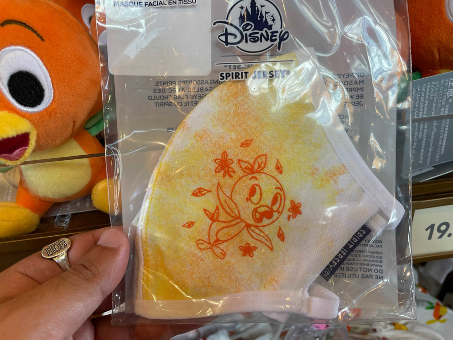 WDWNT's tweet photo. PHOTOS: New Orange Bird Face Mask by Spirit Jersey Flies into 2021 Taste of EPCOT International Flower &amp; Garden Festival

https://t.co/pqfNVkPn6a https://t.co/Wsj5zBlZ7c