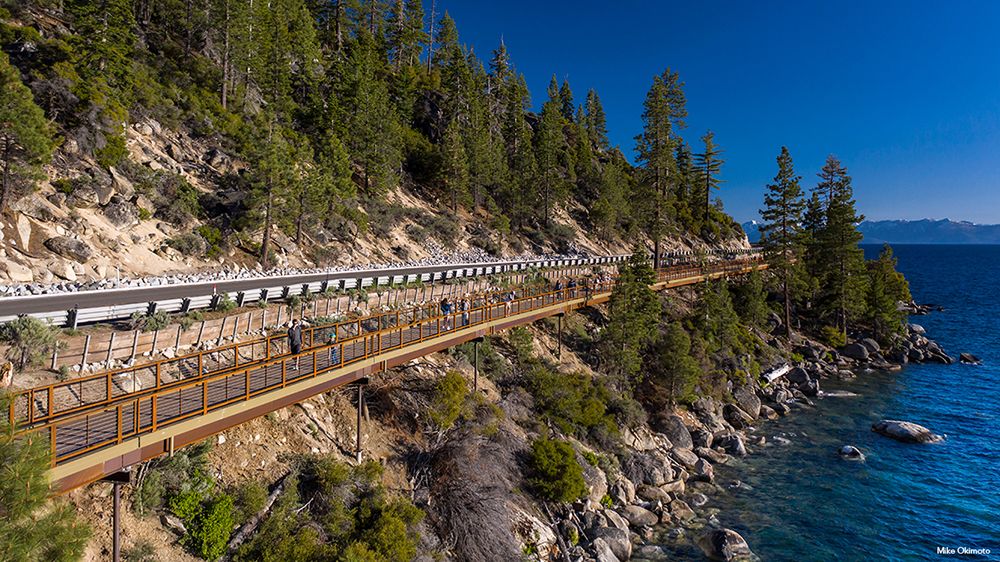 Because the East Shore Trail Bridge is highly visible from #LakeTahoe, the steel girders and hand railings use #WeatheringSteel to blend in with the natural terrain. Admire the scenery while you build our puzzle featuring this #PrizeBridgeAward project! aisc.org/puzzles