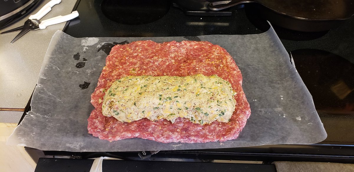 EvolutionPrime's tweet image. #BaconExplosion  One pound bacon weave wrapped around 2 pound sausage middle layer wrapped around the cream cheese filling center.