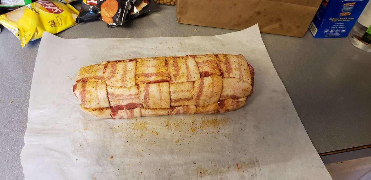 EvolutionPrime's tweet image. #BaconExplosion  One pound bacon weave wrapped around 2 pound sausage middle layer wrapped around the cream cheese filling center.