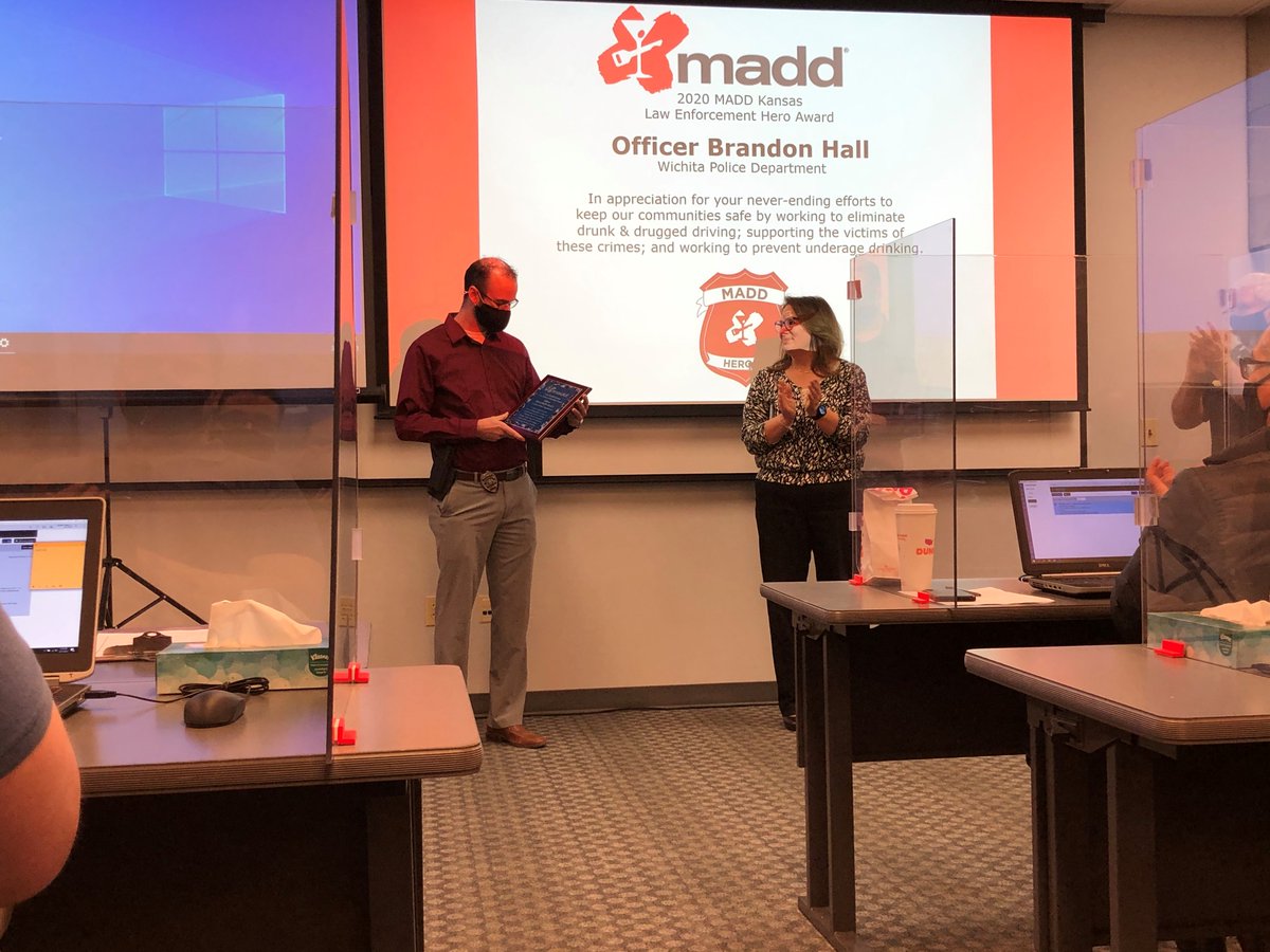 WichitaPolice's tweet photo. Yesterday, Officer Brandon Hall was awarded the Law Enforcement Hero Award from MADD for his continual and dedicated efforts in eliminating drug and drugged driving, supporting the victims of these crimes, and working to prevent underage dirking. #wpdcares https://t.co/FRxJ3I2m4z