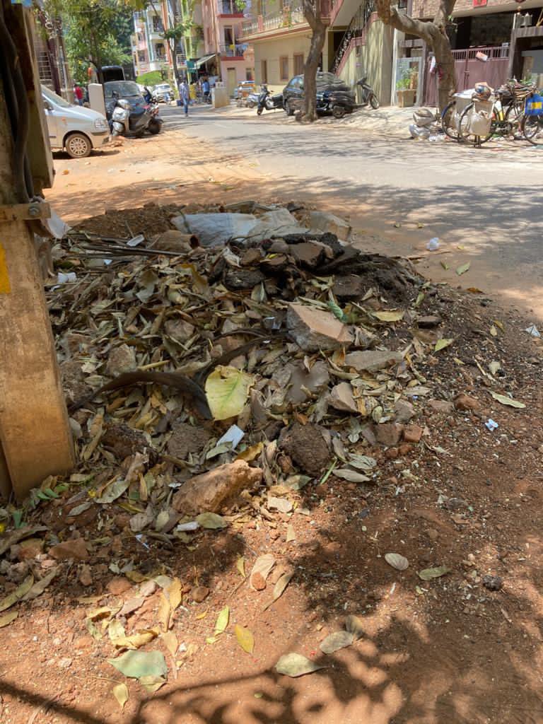 ManeeManjunath's tweet photo. 2months after the drains were repaired, @BBMPCOMM #BBMP has still not cleared the debris & the area is being used to dump garbage by the pourakarmika. This is the case across #Ward65 Kadumalleswara. Is this how #Bengaluru will be a #SmartCity & #India #SwachhBharat ? @drashwathcn https://t.co/P6uyK3gTzR