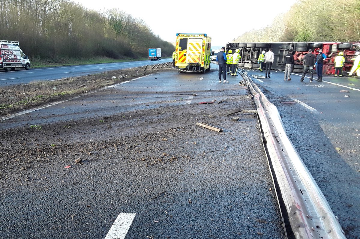 HighwaysSWEST's tweet photo. Update: #M5 northbound between J26 (near #Wellington) to J25 (#Taunton) - There is lots of barrier damage and an overturned LGV. We're currently in the process of releasing trapped traffic. If you're in the traffic, please bear with us, we'll get to you as soon as we can. Thanks https://t.co/l4UgZkvFNe