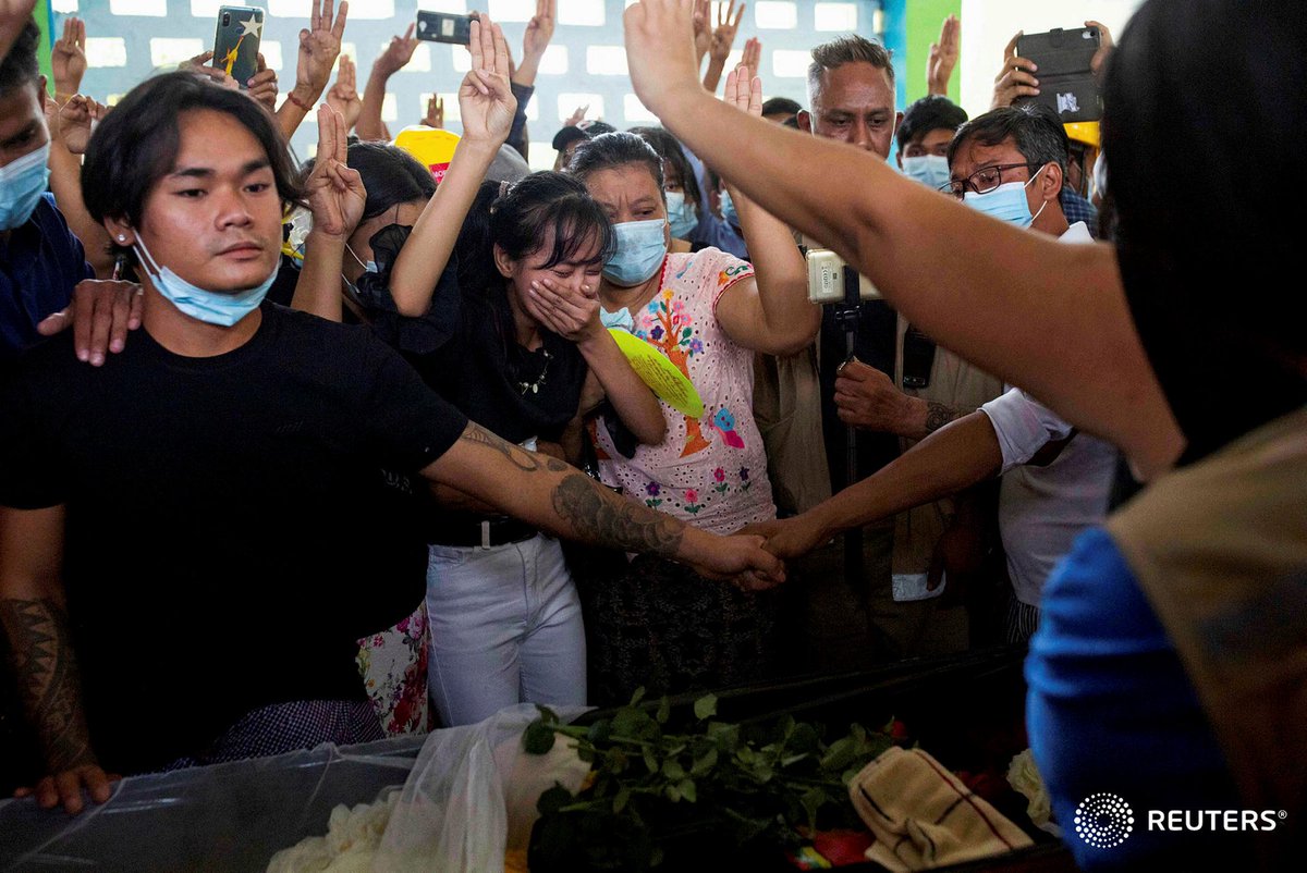 People attend a funeral of Chit Min Thu, who died in an anti-coup protest in North Dagon Township in Yangon, Myanmar, March 13, 2021. REUTERS #WhatsHappeningInMyanmar