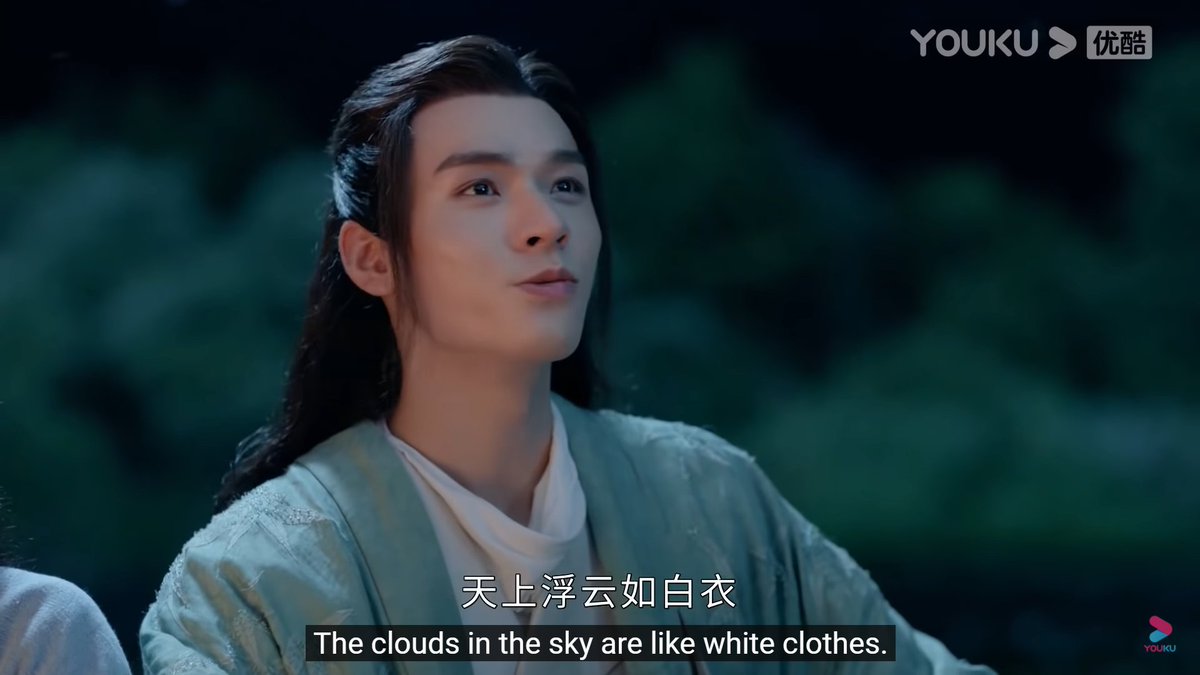 so in case it's not clear what he's talking about he's saying: the clouds in the sky look like white robes, but in another moment they can turn into the appearance of a grey dog. it has been so from past to present, anything could happen in this living world.