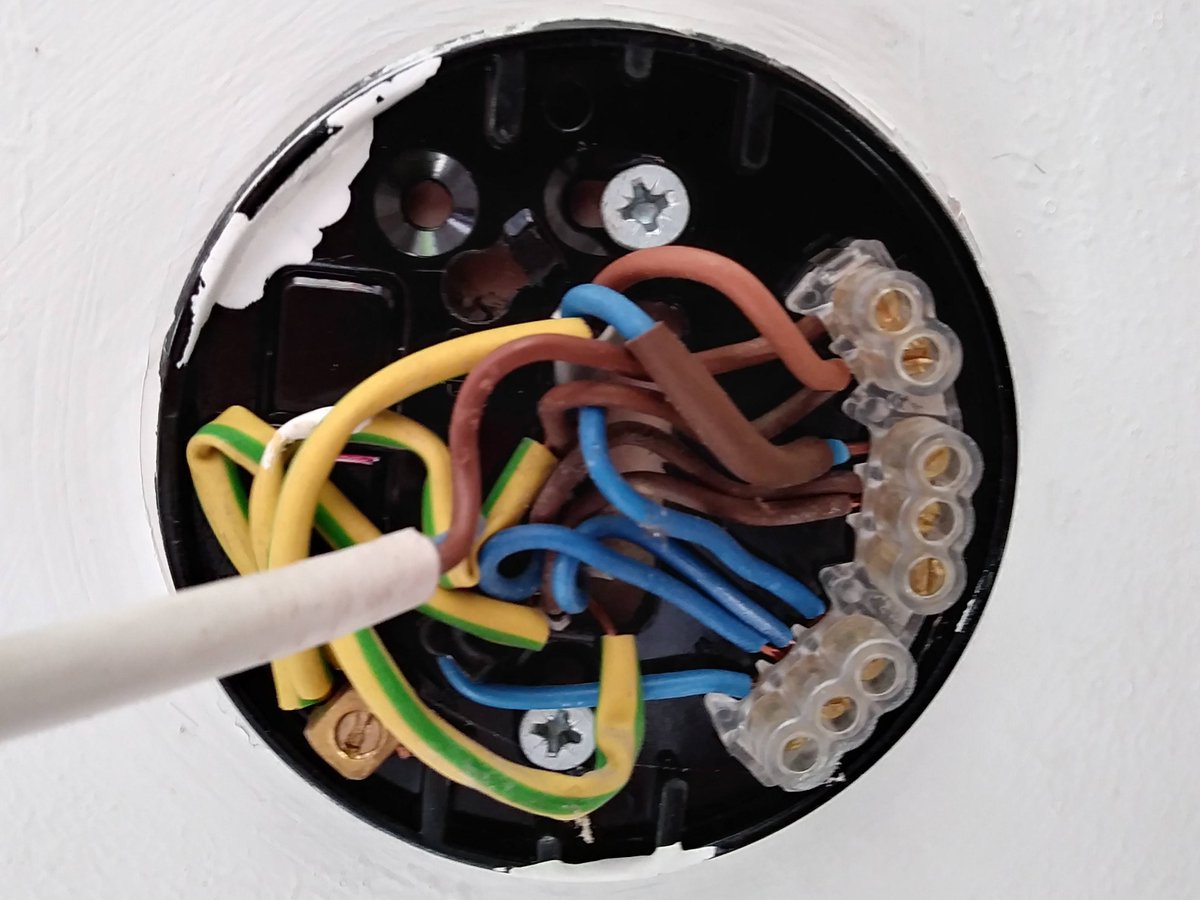 I always find it amazing that this is the correct way to wire up a simple one-switch-one-bulb room light here in the UK. The installer UX is just terrible. Fortunately if you get it even slightly wrong then it goes bang straight away so at least the feedback loop is tight.