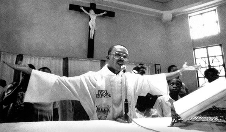 In 1990, Haiti held its first democratic elections since the rise of the Duvaliers. The front runner, Jean Bertrand Aristide, a liberation theologist and priest was the front runner, competing against a slew of foreign backed politicians.