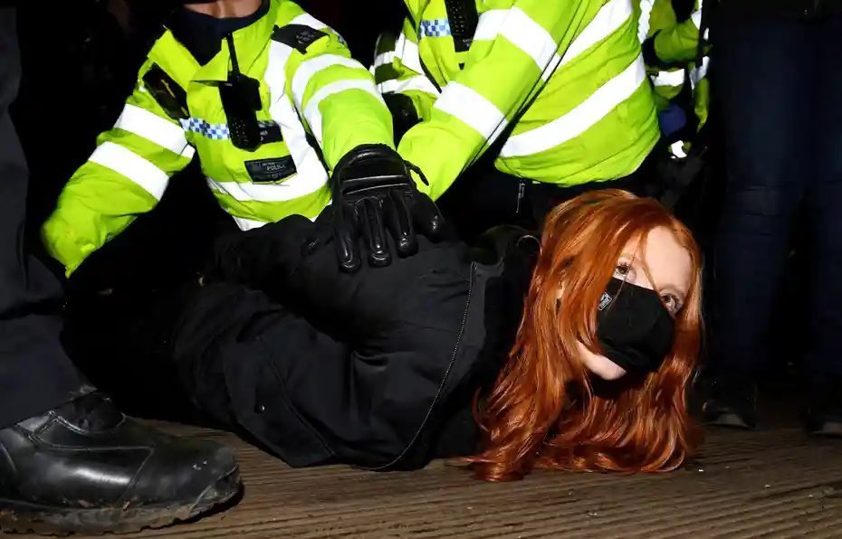 Men Women celebrating protesting football violence